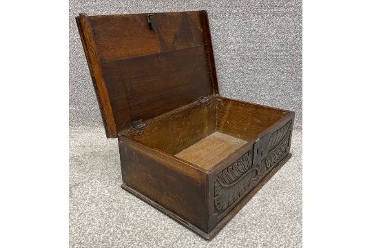 A 17th century oak bible box with carved leaf and branch decoration. H.20 W.58 D.35cm - Image 5 of 9