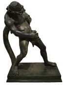 A 19th century bronze figure; The Drunken Faun of Pompeii, signed Amodio Napoli. H.55 W.43cm.