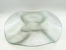 A translucent freeform art glass centrepiece. Dia.49cm.