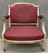 An early 20th century painted and brass inlaid armchair raised on fluted tapering supports. 87 x