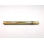 A gilt retractable fountain pen. L.8.9cm as a pen L.10.7cm 8.64g gross