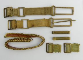 Busby chin strap and straps with brass buckles.