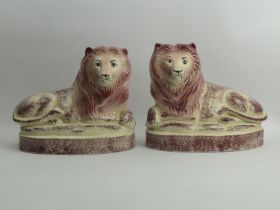 A pair of large Rye pottery lion figures, 22cm x 26cm.
