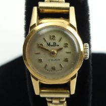 18ct gold Mudu manual wind watch, 16.5mm wide. Condition Report: In good working order.