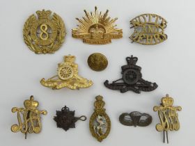 Various military cap badges.