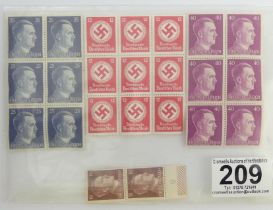 Twenty three World War II German stamps.