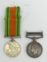 George VI service medal with Palestine bar to 4389776 Pte Walker Green Howards and service medal