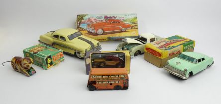 Minster Delux friction tin plate car, a clockwork tin plate bus and other tin plate toys.