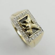 Gents 9ct gold diamond set eagle design ring, 5.9 grams, 12mm, size X.