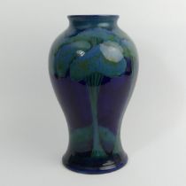 Large Moorcroft moonlit blue baluster vase, designed by William Moorcroft, C.1925, 33cm.