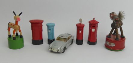 Corgi 007 Aston Martin DB5, complete with figures, various diecast post box and two wooden toys.