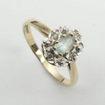 9ct gold aquamarine and diamond ring, 1.6 grams, 9mm, size L.