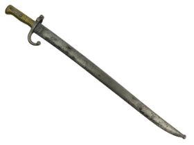 French Chassepot bayonet and scabbard blade, signed and dated 1868, 71cm overall length.
