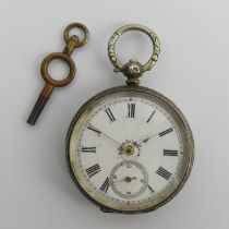 Silver fancy dial open face key wind pocket watch, 39mm x 58mm. Condition Report: In working order.