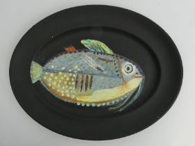 Hand painted oval pottery dish, fish design, signed J.P. 73, probably John Piper, 40cm x 32cm.