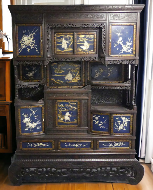 Late 19th century Japanese Meiji period Shibayama display cabinet, the blue lacquered panels