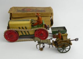 Essdee boxed tin plate clockwork tractor and Greppert & Kelch G&K clockwork tin plate pony & trap.