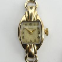 Ladies 1950's Tudor Rolex 9ct gold manual wind watch on a plated strap, with original paperwork,