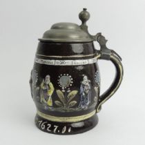 German slip ware, pewter lidded stein, decorated with the Apostles in relief and dated Anno 1627,