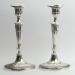 A pair of Walker & Hall silver candlesticks, Sheffield 1906, 2072 grams (albeit weighted), 29cm.