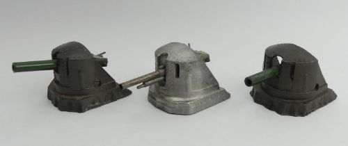 Three Astra diecast toy canons, 11cm.