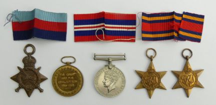 Two World War I medals and three from World War II in War Office box.