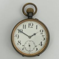 An oversize gun metal pocket watch from the early 20th Century, 95mm x 65mm.