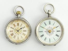 Two fancy dial silver open face pocket watches, largest 54 x 37mm.