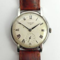 Longines manual wind gents watch on a leather strap, 37.5mm inc. button.