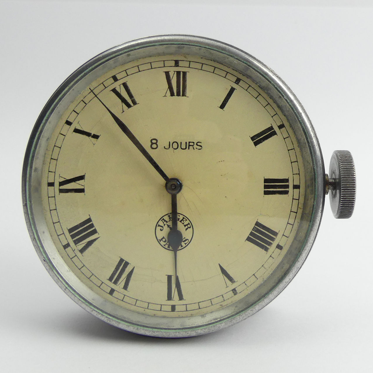 World War II Jaeger Paris 8 Jours clock with mounts, 84mm in diameter. Condition