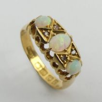 George V 18ct gold opal and diamond ring, Birm.1916, 2.7 grams, 7mm, size K1/2.