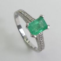 18ct white gold, emerald (approx 1ct) and diamond ring, 3.8 grams, emerald 6.9mm x 5mm, size N.
