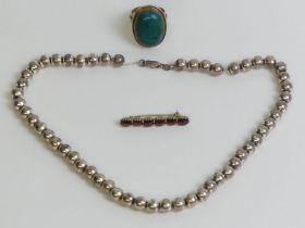 Silver bead necklace, Native American turquoise set ring and a Bohemian garnet silver vermeil