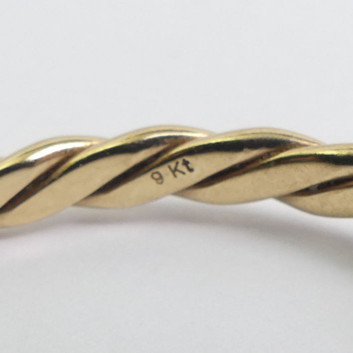 A solid 9ct gold torque bangle, 13.5 grams, 7.8mm. - Image 3 of 4
