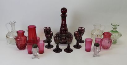 A quantity of glassware to include an Art Deco decanter, cranberry glass jugs and a decanter set.