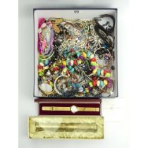 A large box of costume and silver jewellery.