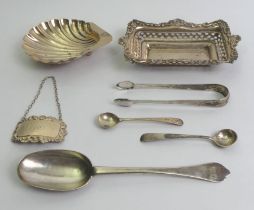 Seven items of silver including a Georgian spoon, Georgian sugar tongs, a silver dish and other