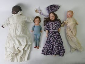 Four old dolls to include an Armand Marseille bisque head example.