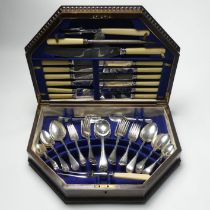 An oak cased 61 piece canteen of silver plated cutlery dating from the 1930's.