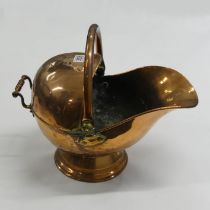 Victorian copper helmet form coal scuttle. 37 cm high. Collection only.