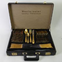 A Westminster luxury 24ct gold plated cutlery set in a fitted case.