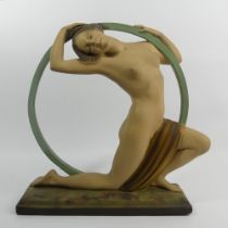 Classic Art Deco plaster girl in a hoop figure, reg no 818406, 37cm high.