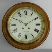 Large Victorian oak wall clock by Lewis & Son, the movement striking on a bell.