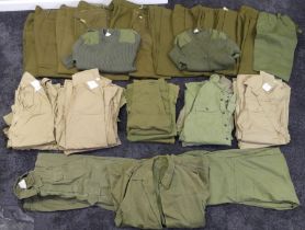 Nine pairs of army khaki trousers together with shirts , t-shirts and jumpers.