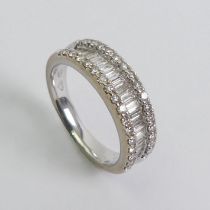 18ct white gold diamond half eternity ring, 5.2 grams. Size M 5.6 mm wide.