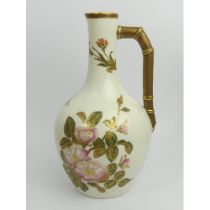 Royal Worcester ivory porcelain jug decorated with flora and fauna, dating from C.1884, 26cm.