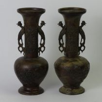 A pair of 19th century Japanese bronze vases. 30 cm.