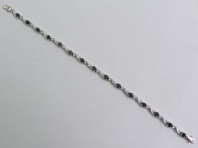 9ct white gold sapphire and diamond bracelet, 9.4 grams, 19.5cm x 3.5cm.