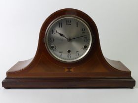 An Edwardian Napoleon hat design chiming inlaid mahogany mantle clock 27cm x 45cm.