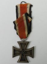 Iron Cross 2nd class 1939 with iron centre and ribbon. Comes with a c.o.a.